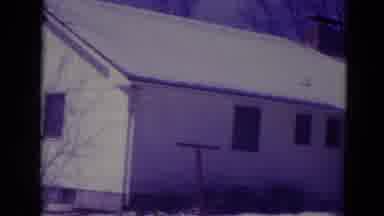 Orlando Florida USA (1974): The Outside Of A Modest House Is Seen And Snow Is The