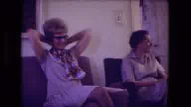 Fort Wayne Indiana (1974): People Relax And Visit In Living Area Of A Home Showing