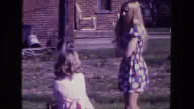 Fort Wayne Indiana (1974): A Group Of Children Walking And Waving At The Camera