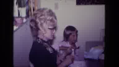 Fort Wayne Indiana (1974): A Lady Folding Up Clothes Doing Laundry