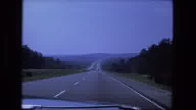 Fort Wayne Indiana (1974): A Long Highway With Greenery On Either Sides And Some