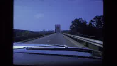 Fort Wayne Indiana (1974): Car Driving Across An Old Bridge From The Perspective
