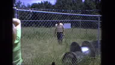 Fort Wayne Indiana (1974): Man Walking Toward Fence To Meet With His Family