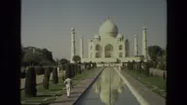 India (1974): A White Building And A Person Walking Toward The Taj Mahal In India
