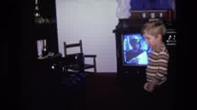 California USA-1975: Child Plays With McDonald's Toy Set In Living Room