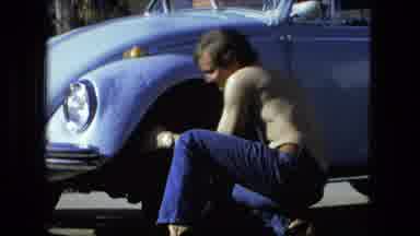 Fort Wayne Indiana (1976): Three Young Men Work On The Car Together In The