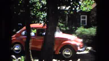 Fort Wayne Indiana (1976): Camera Pans From Red Vw Bug Over To House Where Child