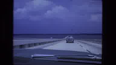 Fort Wayne Indiana (1974): Old Footage Of A Car Driving On A Bridge During The Day