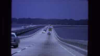 Fort Wayne Indiana (1974): Car Going Along Bridge Or Causeway Over A Body Of Water