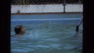 Fort Wayne Indiana (1974): Two Children Swimming In Pool With Red Flotation Toy