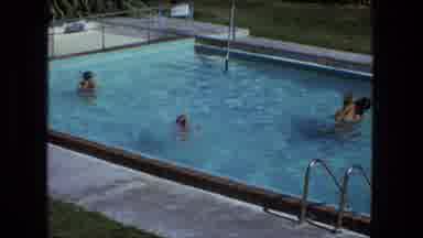 Fort Wayne Indiana (1974): Family Watching As Little Girl Practices Swimming In