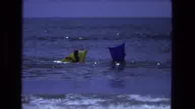 Fort Wayne Indiana (1974): Children On Inflatable Toys In The Ocean While Others