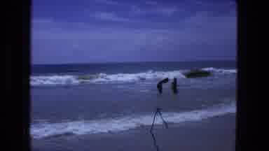 Fort Wayne Indiana (1974): People In The Water At The Beach As Waves Are Coming