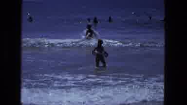 Fort Wayne Indiana (1974): Child With A Float Wades Out Into The Water And Rides