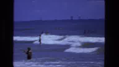 Fort Wayne Indiana (1974): People Are Having Fun Swimming In The Large Ocean On
