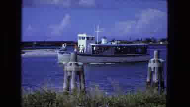 Fort Wayne Indiana (1974): People Doing Boat Ride On Very Sunny Day With View Of