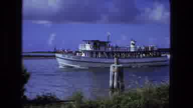 Fort Wayne Indiana (1974): A Ferry Full Of People Carrying Passengers Across A