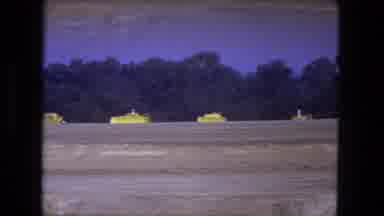 Fort Wayne Indiana (1974): A Person Dressed As A Sailor Walks Away From A Toy Boat