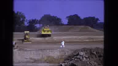 Fort Wayne Indiana (1974): Workers Prepare To Move Big Digging Machines Around