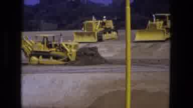 Fort Wayne Indiana (1974): Seven Vintage Yellow Bulldozers Excavate A Land Area