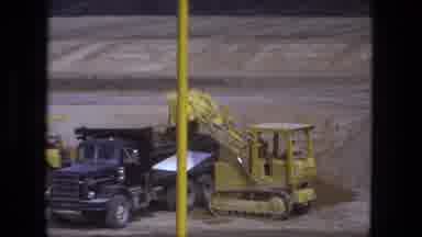 Fort Wayne Indiana (1974): Front Loaders Excavating Construction Site With Dump
