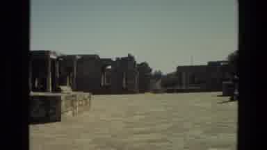 India (1974): Building Ruins With People Walking
