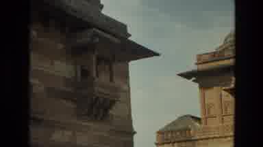 India (1974): Camera Captures The Ancient Looking Buildings As We Move Through The
