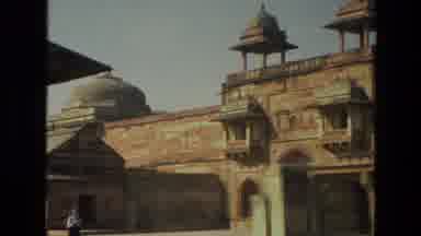 India (1974): Beige Buildings With Turrets And Brickwork Remain Almost Empty While