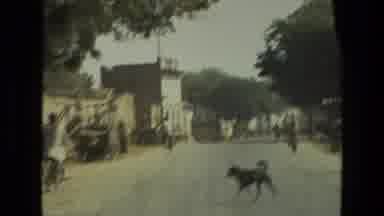 India (1974): Strolling Through Town In A New Automobile On A Beautiful Day