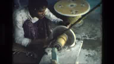 India (1974): An Indian Man And Woman Engaged In Some Craft Perhaps Pottery