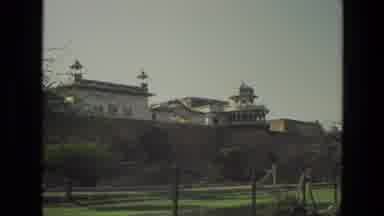 India (1974): Camera Captures The Buildings And Landmarks Then Passes By A Camel