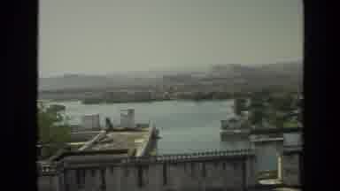 India (1974): Overview Of A Lake From Outside Of A Church