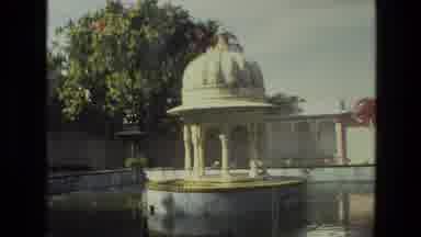 India (1974): A Fountain Turning On And Off Outside