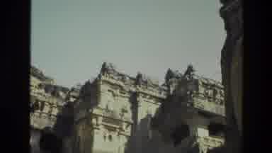 India (1974): Old Footage Of Ancient Rock Sculpted Building Ruins On A Sunny Day