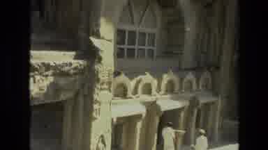 India (1974): People Stand Outside Of An Interesting Looking Church