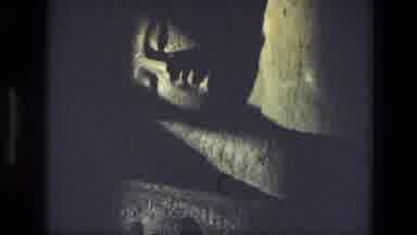 India (1974): Large Stone Statue Of Reclining Giant On A Stone Pedestal With