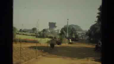 India (1974): Urban Landscape Footage Shot In Vintage With Trees And Buildings