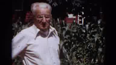 Lincoln Nebraska (1974): Elder Man Talks To The Camera In Front Of His Garden On A