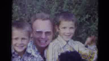 Lincoln Nebraska (1974): Two Boys With Their Dad Waving At The Camera