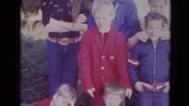 Lincoln Nebraska (1974): Kids And Teens Wearing Blue And Red Winter Wear Stand For