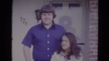 Lincoln Nebraska (1974): Couple Posing In Front Of Their House