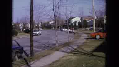 California USA (1975): The Camera Captures Two People Riding A Single Bike Down