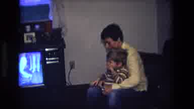California USA (1975): Dad Getting Kid Dressed