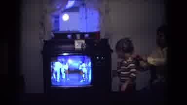 California USA (1975): Little Boy Watching Tv