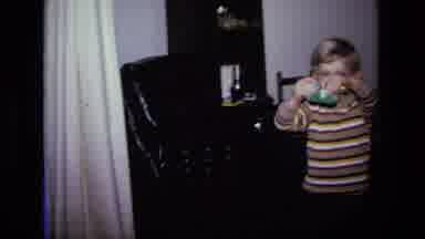 California USA (1975): A Little Boy Who Is Playing With McdonaldâS Play Set And