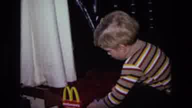 California USA (1975): A Child Playing With Their Toys