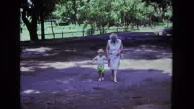 California USA (1975): Grandma Takes Grandson To The Park