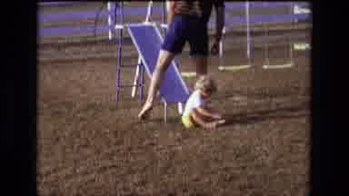 California USA (1975): Cute Child With Daddy Playing In The Park So Happy