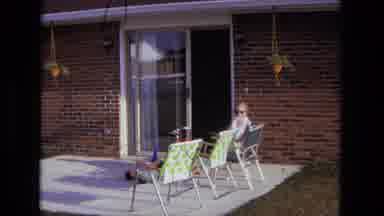 California USA-1975: Child Walking in Snow, Woman Relaxing on Patio