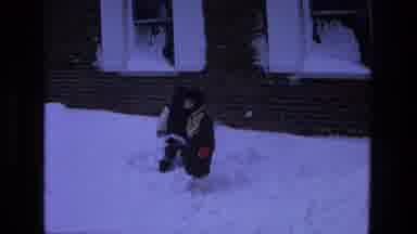 California USA (1975): Two Children Playing With White Snow